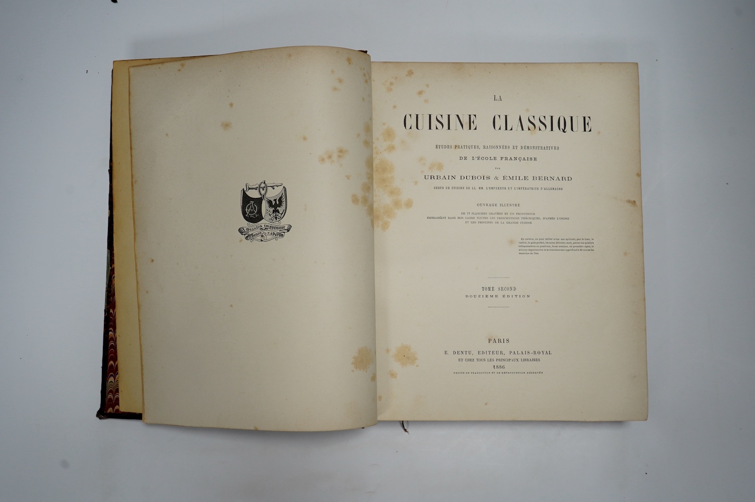 Dubois, Urbain and Bernard, Emile - La Cuisine Classique: études practiques, raisonées et dé l'Ecole Francaise ... douziéme edition, 2 vols. frontis., engraved menu and 74 (ex 75) plates; contemp. gilt ruled maroon half